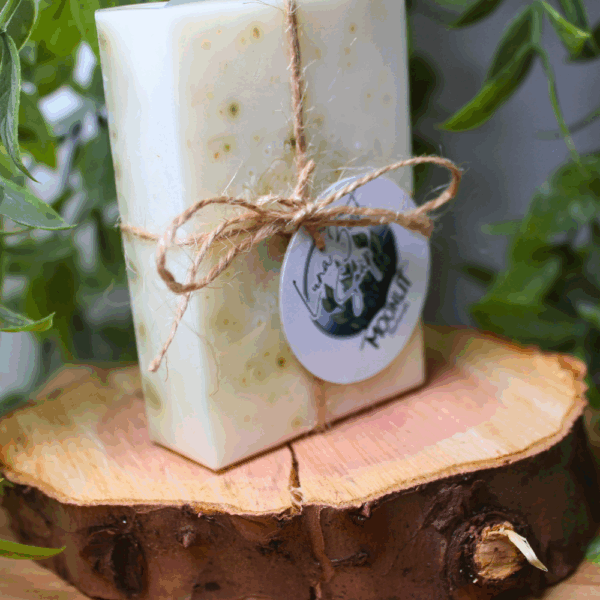 Luna Zest natural handmade soap bar with dried lime leaf, shea butter, and citrus essential oils, crafted by Moonlit Naturals.